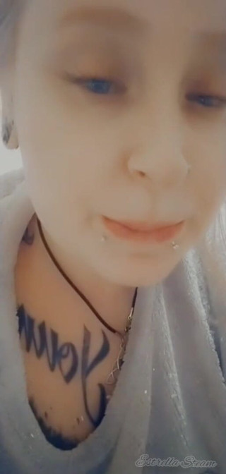 Estrella Steam: Girl with piercings smokes a cigarette