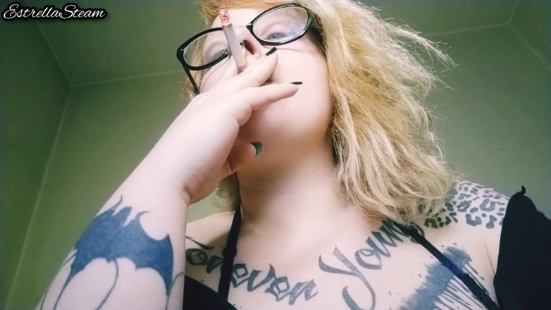 Estrella Steam: Blonde smokes a cigarette NO AUDIO
