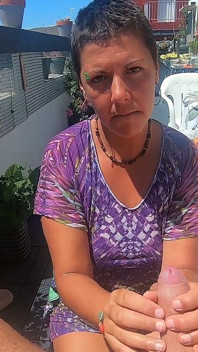 Blowjob on our terrace with some handfree sucking