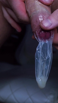 Strong Handsome Guy Jerks off His Big Dick in a Condom