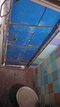 Construction Site Bathroom and Workers