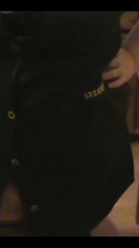 Robe-wearing Dominatrix