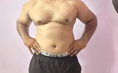 Muscular Indian Man Jerking While Standing