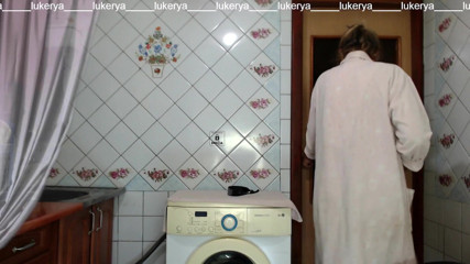 Lukerya: Hot Hostess Lukerya in the Kitchen in a Dressing Gown