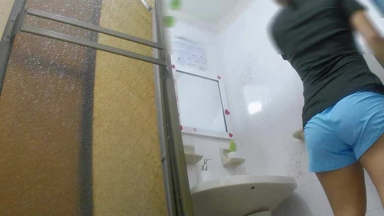 pampammedallo: Athletic Girl Pissing in Public Bathroom