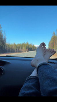 Feet on the dashboard