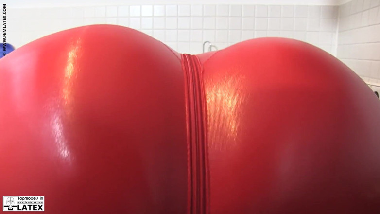 Fem Latex: Ketrin in a tight red latex costume