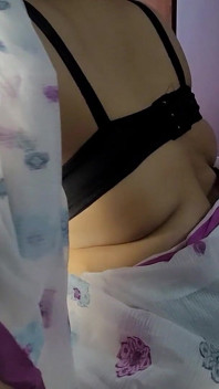 Beautiful Bangladeshi girl wearing a saree showing off her beautiful figure