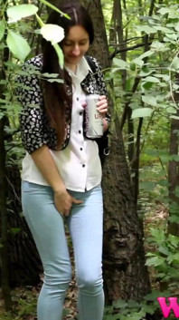 Skinny Brunette Desperate to Pee in the Woods Has to Find a Way to Empty Her Bladder