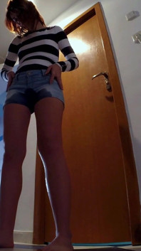 Skinny Redhead Pee in Her Short Jeans