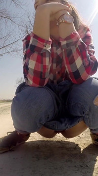 Desperate Babe with Full Bladder Empty Her Bladder and Pee on a Dirt Road