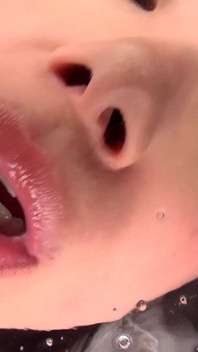 Sobrecarga De Saliva En Primer Plano: La Lengua Goteando De Tsubaki Kato Se Unta La Cara Hasta Que Se Pierde En Su Boca.