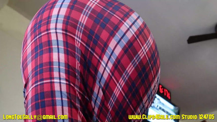 Long Toe Sally Big Buns: Wearing a plaid skirt