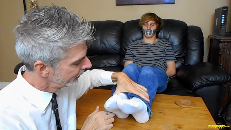 Man Puppy: Elis Squirms on the Couch