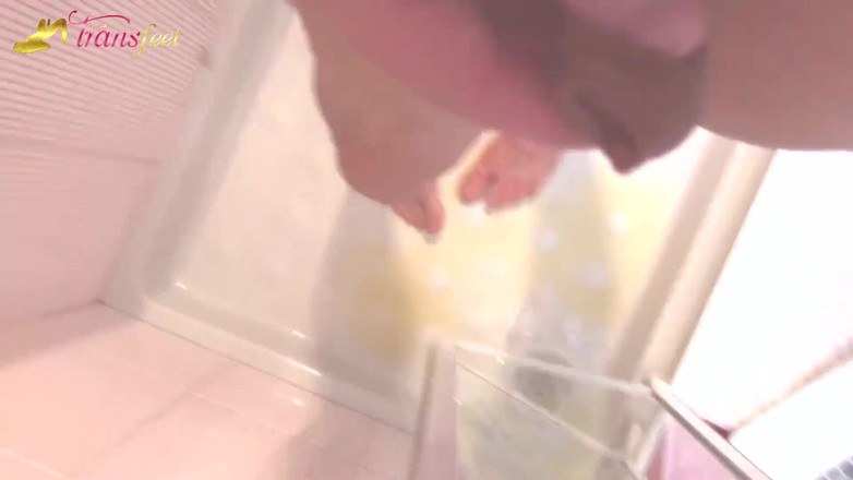 Trans and Cross-Dressers Feet: Brunette transsexual Irenere llish loves to piss in the bathroom