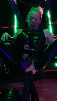 The rubber Domme the giant dildo and the gimp