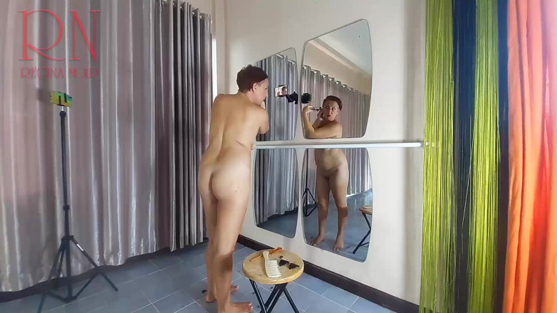 Regina Noir: Naked nudist hairdresser. She cuts her own hair. Regina Noir...