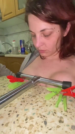 Elena917: tits with clamps and pressing - solo