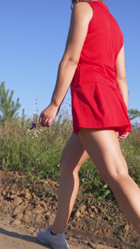 Girl in Short Dress Walks Outdoor and Flashing Butt