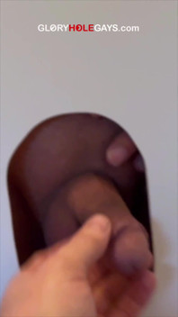 Straight Stud Fingers the Gloryhole Mouth Like a Wet Pussy
