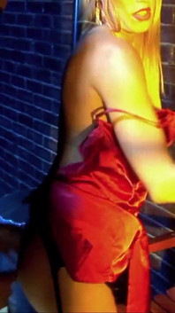 At the bus stop the sexy MILF fills with attention the willing cock of a boy
