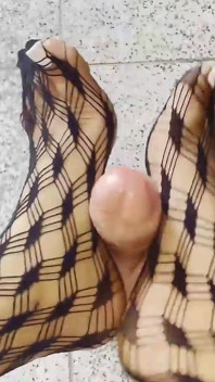 Tattooed MILF Teases Toy with Nylon Feet