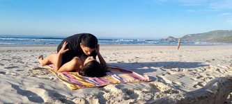 Caught Couple on the Beach