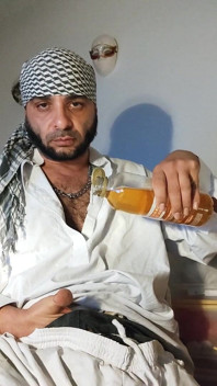 Dirtyjunkbro Dressed in Afghan Clothes, Cover Socks Piss in and Piss Drink