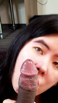 Chinese Girl Fits Her Tiny Mouth Around a Thick Black Cock