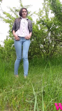 Desperate Skinny Girl in Jeans Trying to Hold Her Pee in the Forest