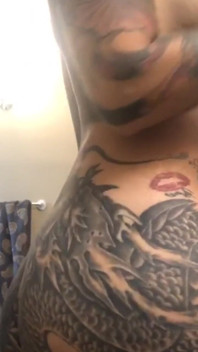 Busty Tattooed Babe