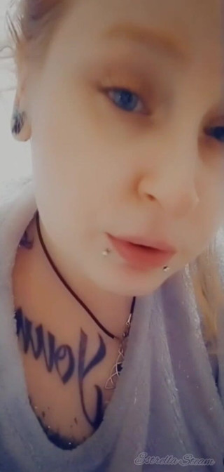 Estrella Steam: Girl with piercings smokes a cigarette