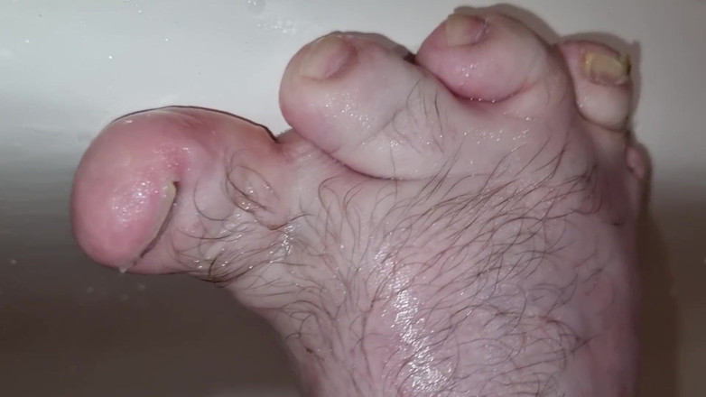MiniCorgi: Midget shows his feet and then cums on them