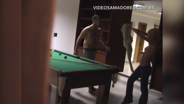 Amateurs videos: Couple having sex in the hotel game room in Brazil