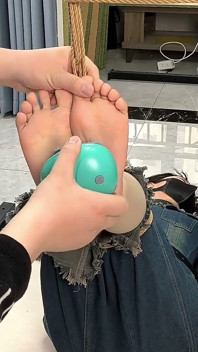 My Girlfriend Was Tied to an Iron Frame, Her Bare Feet Suspended and Tickled