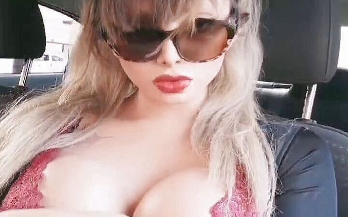 Alarcon Sherly: Tranny moving her tits in the car