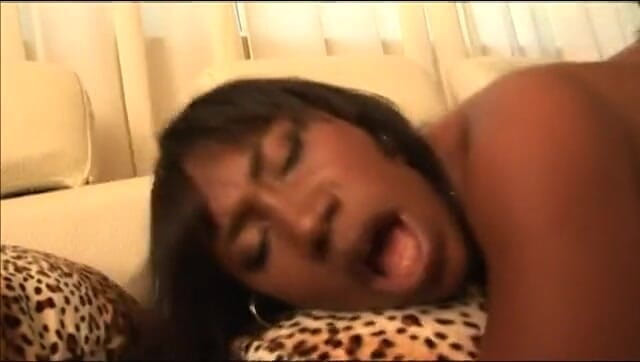 Big Black World: Black dude bangs an ebony hottie on the sofa