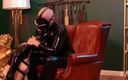 Rubber pervs: German Rubber Slut Get`s Spanked While She Is Bend Over...