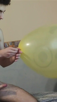 Blowing up a Huge Smiley Balloon While Jerking off