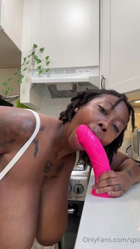 Nasty Ebony Bitch Sucks Dildo with Passion