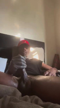 Masturbating