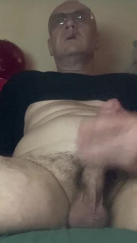 Masturbating