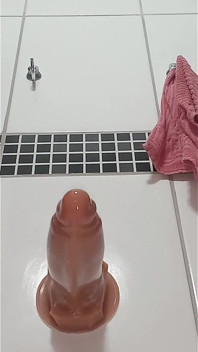 In the Bathroom Shoving the Dildos in My Ass