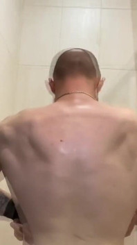 Alpha Shows off His Back Muscles