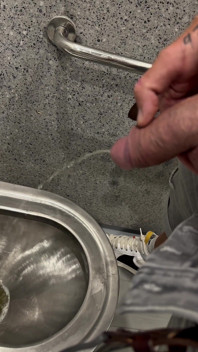 Jerking and Pissing on a Motorway Rest Area