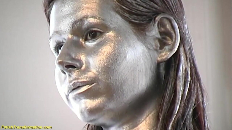 Fetish Islands: Silver metallic painted bald head statue mannequins posing