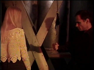 Sex Karma: Sexy blonde is bound in red and has clamps applied...