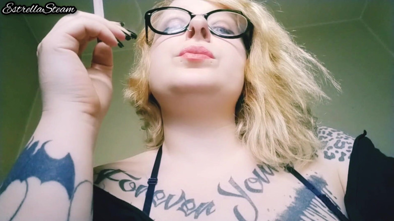 Estrella Steam: Blonde smokes a cigarette NO AUDIO