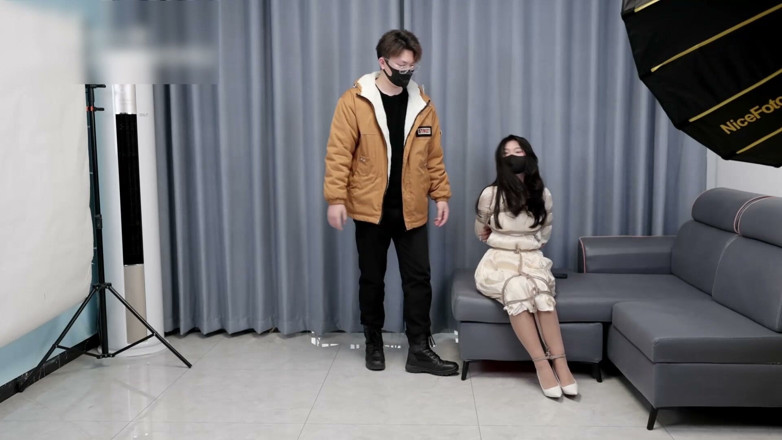 Asian bondage: Girlfriend in a Dress and Stockings, Bound by Rope