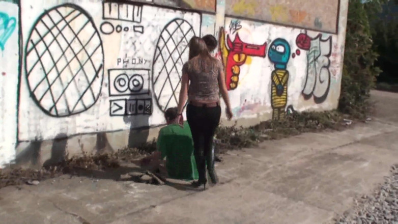 Femdom Austria: Kicking a Horny Guy in the Street